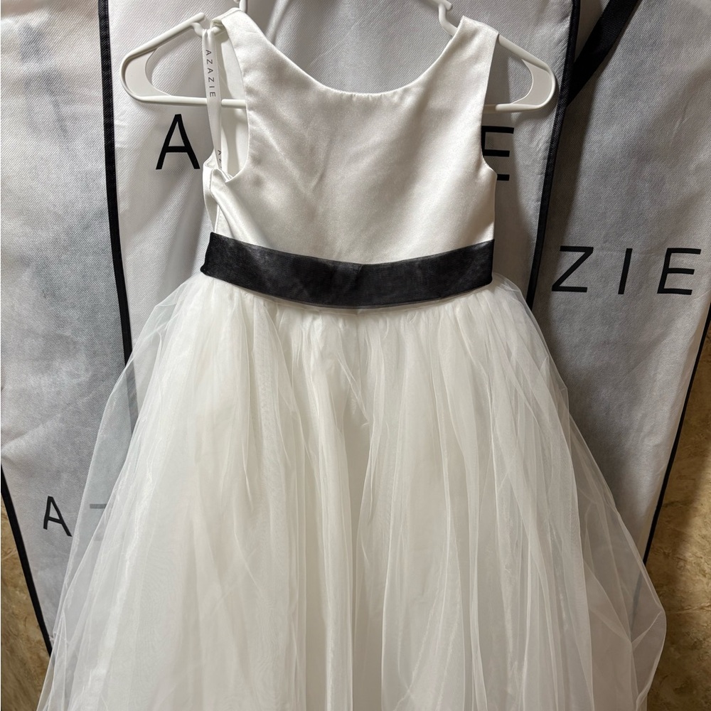 Azazie Ivory and black flower girl dress
